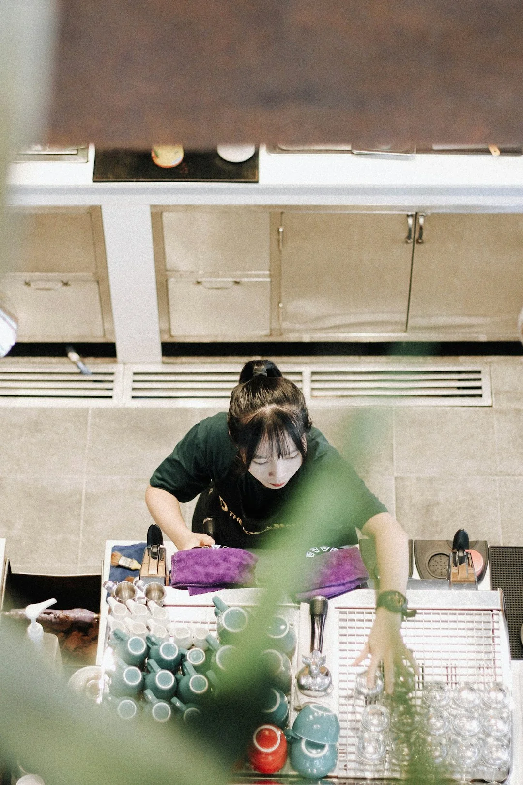 Cleaner cleaning the floor in a laboratory environment